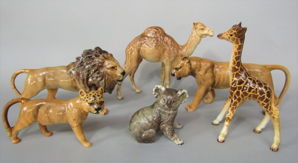 A collection of six Beswick animals (mostly for restoration) including a family of a lion,