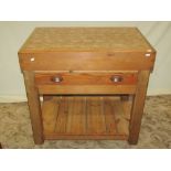 A reclaimed pine floorstanding butchers block and combined stand, incorporating a frieze drawer,