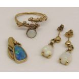 Group of 9ct opal jewellery comprising a pair of drop earrings set with diamonds and pear cut