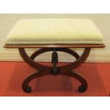 A Regency mahogany X framed centre stool with upholstered top on scrolled supports, together with