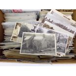 A box containing an extensive quantity of British and European topographical postcards including