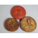 Three old wax document seals, 10cm diameter and smaller