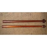 A number of mahogany curtain rails, curtain rings, (etc), 150 cm in length and shorter