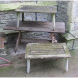 A pair of R A Lister & Co Ltd low Burma teak garden tables of rectangular form with slatted tops