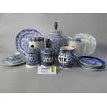 A pair of Emma Bridgewater tea and sugar storage jars and covers with blue sponged decoration