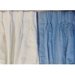 Four pairs of curtains in medium weight white fabric with blue trim, triple pleat headings,
