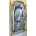 A 19th century style gilded wall mirror with reeded column supports, a further repeating detail