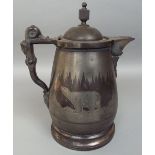 A good quality 19th century pewter pitcher/ale jug of baluster form, engraved with a polar bear in