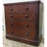 A Victorian mahogany bedroom chest of two short over three long graduated drawers with rounded