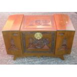 ORIENTAL CAMPHOR WOOD LINED TEAK CHEST WITH CARVED SCENES OF BUILDINGS FIGURES AND TREES (H. 54
