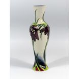 A MOORCROFT POTTERY VASE OF SLENDER BALUSTER FORM, TUBELINED WITH FLOWERS AND FOLIAGE, IMPRESSED AND