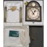 GERMAN JUNGHANS WALL CLOCK WITH A DECORATED ARCHED DIAL ENCLOSING A TWIN TRAIN WEIGHT DRIVEN