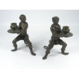 A PAIR OF EASTERN BRONZE MONKEY CANDLESTICKS WITH TAIL SUPPORT, ONE WITH IMPRESSED MARK (H. 16.5 CM)