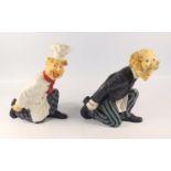 PAIR OF COMPOSITION FIGURAL WINE BOTTLE STANDS AS A CHEF AND WAITER, WITH PAINTED DECORATION (