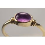 9 CT GOLD OVAL AMETHYST CABOCHON RING, SIZE P 1/2, GROSS WEIGHT 1.6 GRAMS