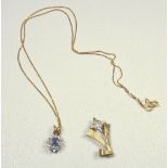 9 CT GOLD BLUE TOPAZ AND DIAMOND PENDANT, A YELLOW METAL' STAR AND TAIL' DESIGN PENDANT STAMPED 9 K,