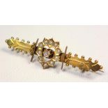 VICTORIAN 9 CT GOLD, SEED PEARL AND DIAMOND BAR BROOCH, THE TEN SEED PEARLS IN A HEART SHAPED