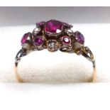 GEORGIAN GOLD, DIAMOND AND BURMESE RUBY RING, SIZE J, SEVEN RUBIES AND FOUR DIAMONDS, I.7 GRAMS