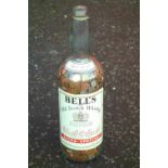 BELL'S 4.5 LITRE BOTTLE FILLED WITH DECIMAL COINS, QUANTITY OF MOSTLY GEORGE VI AND LATER C N AND