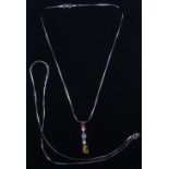 18 CT WHITE GOLD NECKLACE WITH A DIAMOND AND COLOURED STONE SET PENDANT, AND AN 18 CT WHITE GOLD