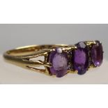 YELLOW METAL DRESS RING STAMPED 18 CT, AMETHYST AND DIAMOND, SIZE N 1/2, SET SEVEN STONES, GROSS