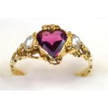 YELLOW METAL FILIGREE RING, SIZE L 1/2, SET HEART SHAPED RED STONE AND PEARLS ON EITHER SIDE,