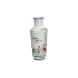 A polychrome porcelain vase, decorated with roosters and bamboo. Dated 2001, made by Jingdezhen