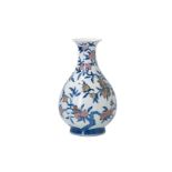 A blue and underglaze red porcelain vase, decorated with flowers. Marked with seal mark Yongzheng.