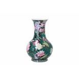 A polychrome porcelain vase, decorated with flowers. Marked with seal mark Li Ling. China, 20th
