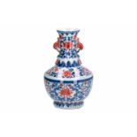 A polychrome porcelain vase, decorated with flowers. Marked with 6-character mark Qianlong. China,