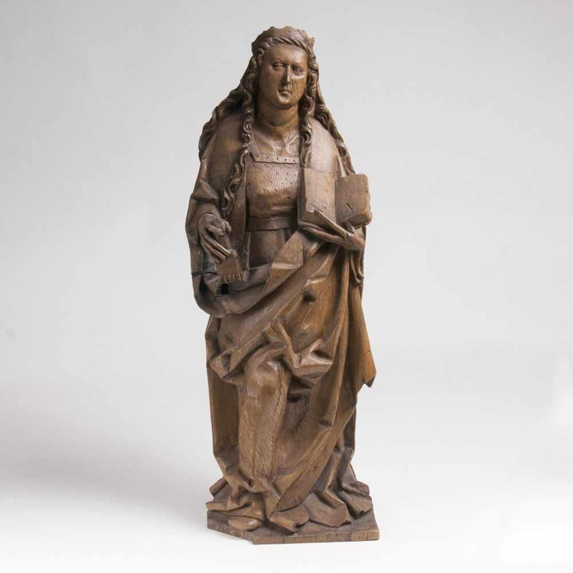 Spätgotische Figur 'Hl. Katharina'Mecheln, Ende 15. Jh. Eiche, geschnitzt, Rückseite gehöhlt, ohne