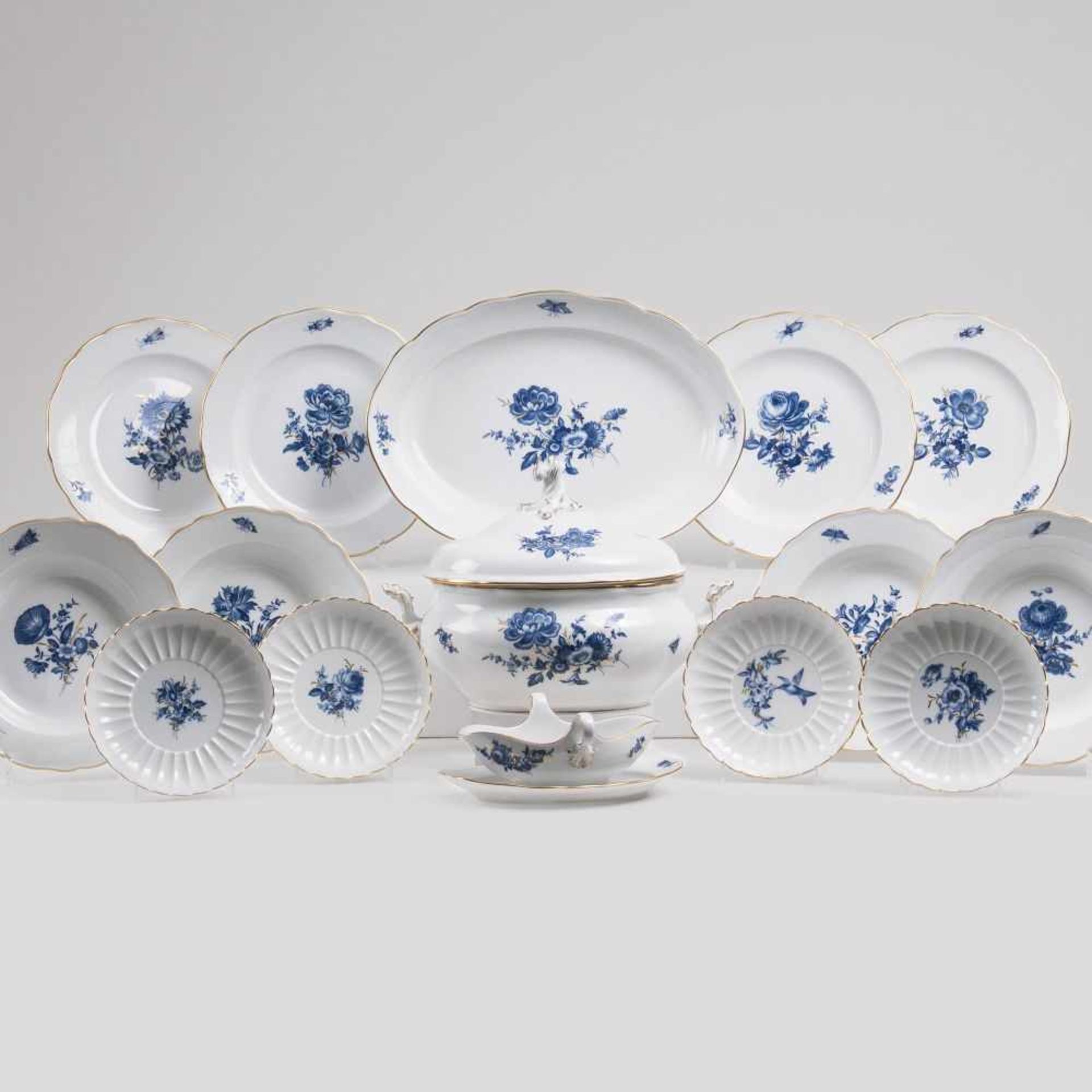 A Dinner Service 'Blue Flower with Insects' for 6 Persons