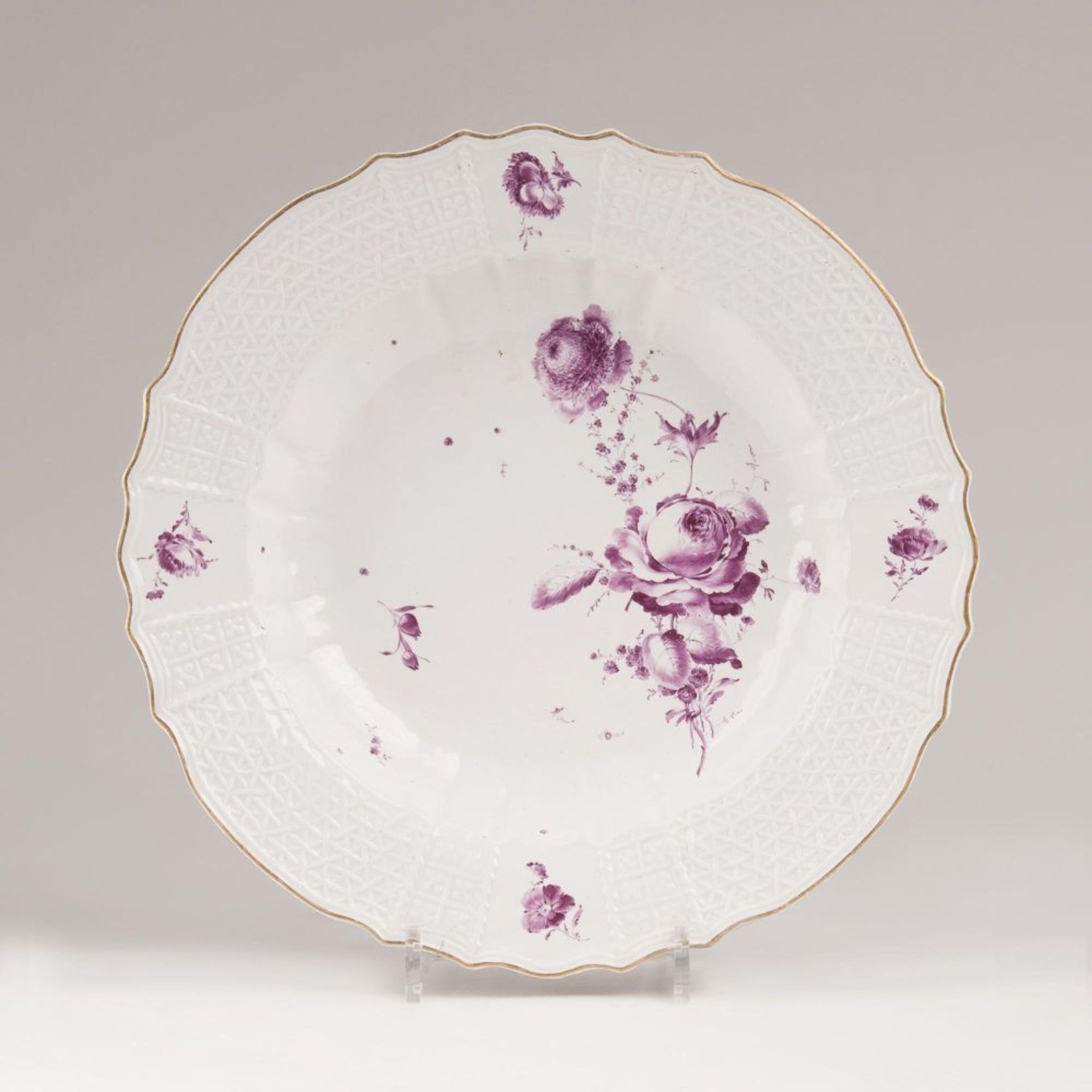 A Large Round Plate with Crimson Flowers