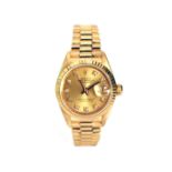 A LADY'S 18CT GOLD WRISTWATCH, ROLEX