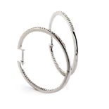 A PAIR OF DIAMOND HOOP EARRINGS each hoop hinged with 34 micro-set round brilliant-cut diamonds to