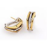 A PAIR OF DIAMOND EARRINGS each comprising of three bands of alternating yellow and white gold