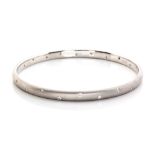 A STARLIGHT DIAMOND BANGLE the continuous band interspersed with 22 round swiss-set brilliant-cut