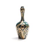 A WILLIAM MOORCRAFT MACINTYRE FLORIAN WARE VASE, CIRCA 1903 of baluster shape, with raised Art