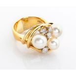 A DIAMOND AND PEARL RING, IMMO BÖHLKE 3 graduating pearls interspersed with 4 claw-set round