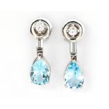 A PAIR OF DIAMOND AND AQUAMARINE DROP EARRINGS each surmount with a claw-set round brilliant-cut