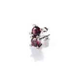A PAIR OF GARNET AND DIAMOND EARRINGS claw-set to the centre with two round brilliant-cut