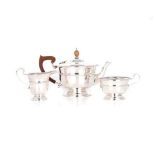 A SILVER THREE PIECE COFFEE SET, BIRMINGHAM, 1958 with beaded borderthe coffee pot 20cm high