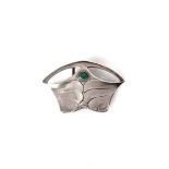 A STERLING SILVER BELT BUCKLE Art Deco-style design with a green triangular-shaped natural agate,