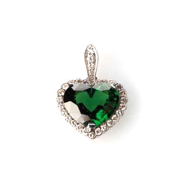 A TSAVORITE AND DIAMOND PENDANT claw-set to the centre with a natural oval heart-shaped tsavorite