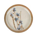 CERAMIC PLATE, TIM MORRIS (1941 – 1989) glazed platter depicting wildflowers, stamped with the