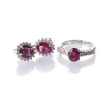 A PAIR OF RUBY AND DIAMOND EARRINGS WITH MATCHING RING claw-set to the centre with a pair of oval