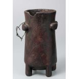 SWAZI MILK PAIL Oval container, undecorated, four lugs one with a hole for hanging, patina. Wood28cm