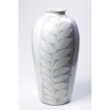 A KALAHARI WARE LAMP BASE The tall ovoid form with a cream-coloured abstract leaf design, painted