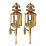 A PAIR OF LARGE VICTORIAN COPPER AND BRASS COACH LAMPS Each hexagonal glazed lamp surmounted by a
