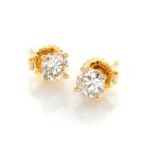 A PAIR OF DIAMOND EARRINGS Each claw set round brilliant cut diamond weighing approximately 1,34ct